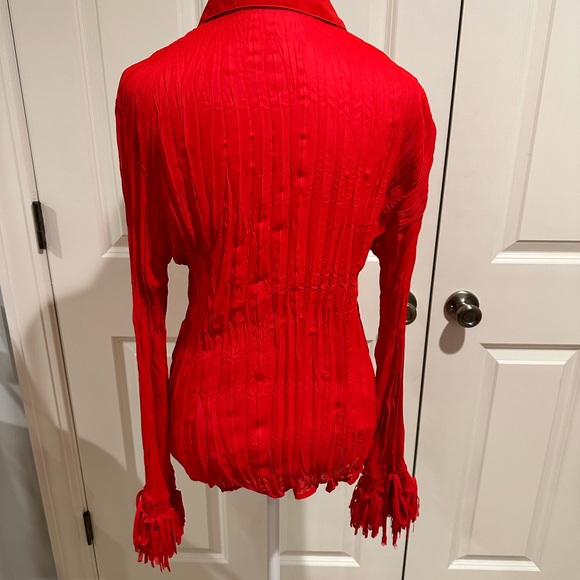 Adorable red long sleeved button up blouse with fringe on front and cuffs. - Picture 4 of 4